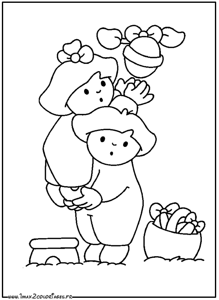 Coloriage 2 enfants prennent un oeuf de paques